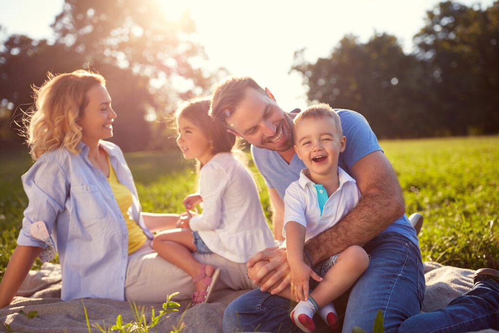 family with children having fun in nature